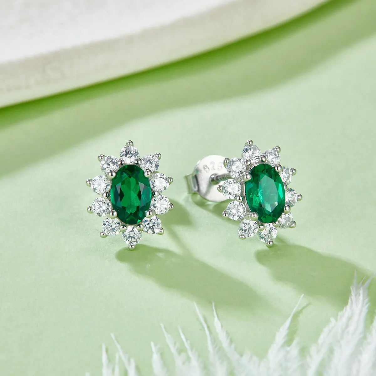 0.8 Carat Oval Lab-Created Emerald Halo Stud Earrings in S925 Silver Plated Platinum