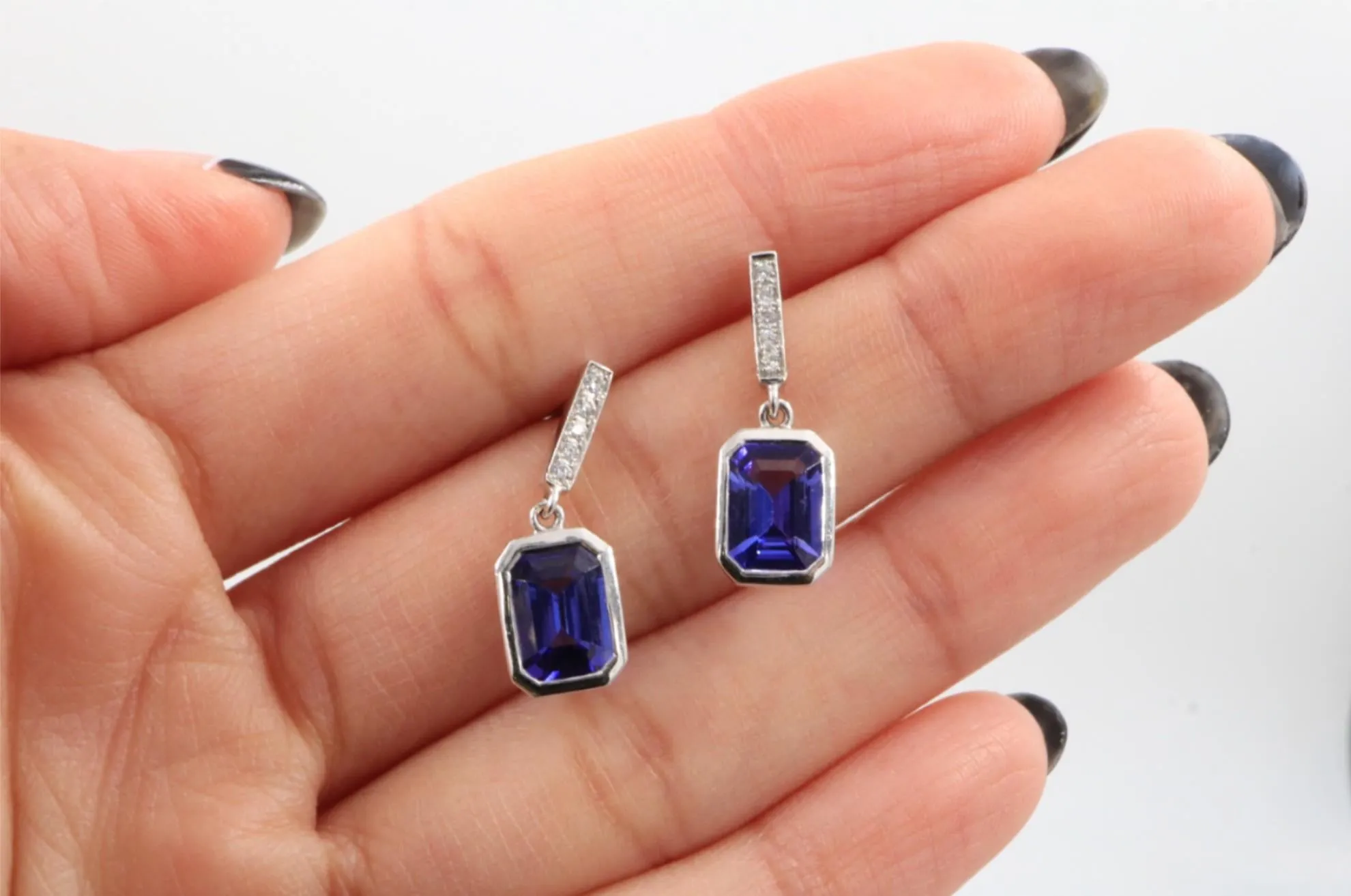 18KW Tanzanite .63 / .08 Diamond and Tanzanite Dangle Bezel Earrings