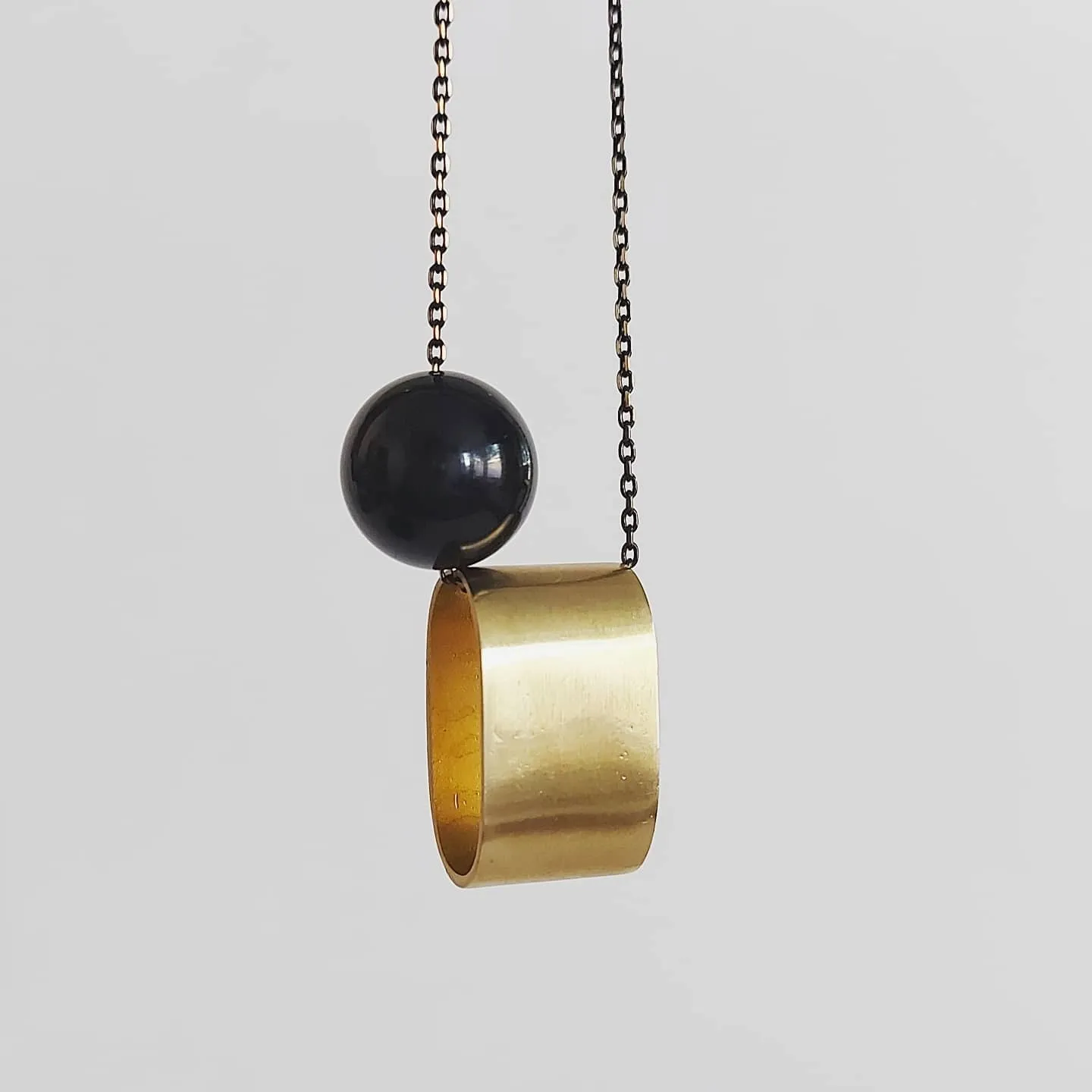 Brushed Brass Oval and Onyx Long Necklace