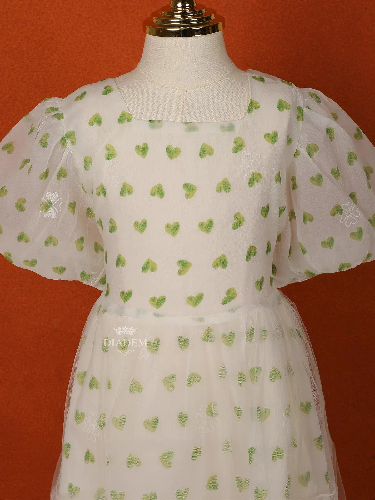 Cream Net Frock Adorned with Heart Prints and Puff Sleeves