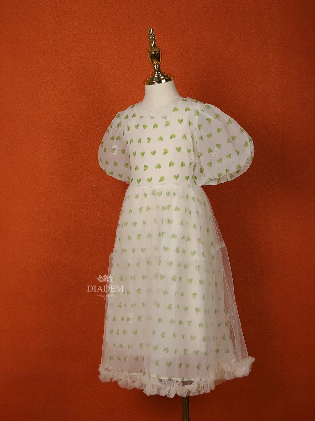 Cream Net Frock Adorned with Heart Prints and Puff Sleeves