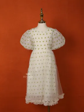 Cream Net Frock Adorned with Heart Prints and Puff Sleeves