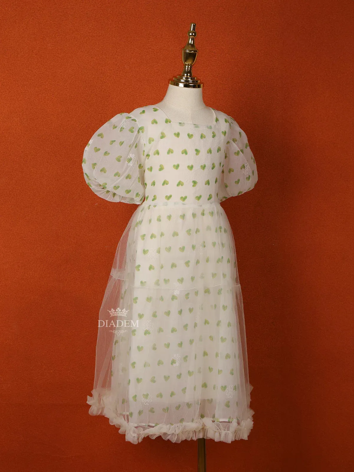 Cream Net Frock Adorned with Heart Prints and Puff Sleeves