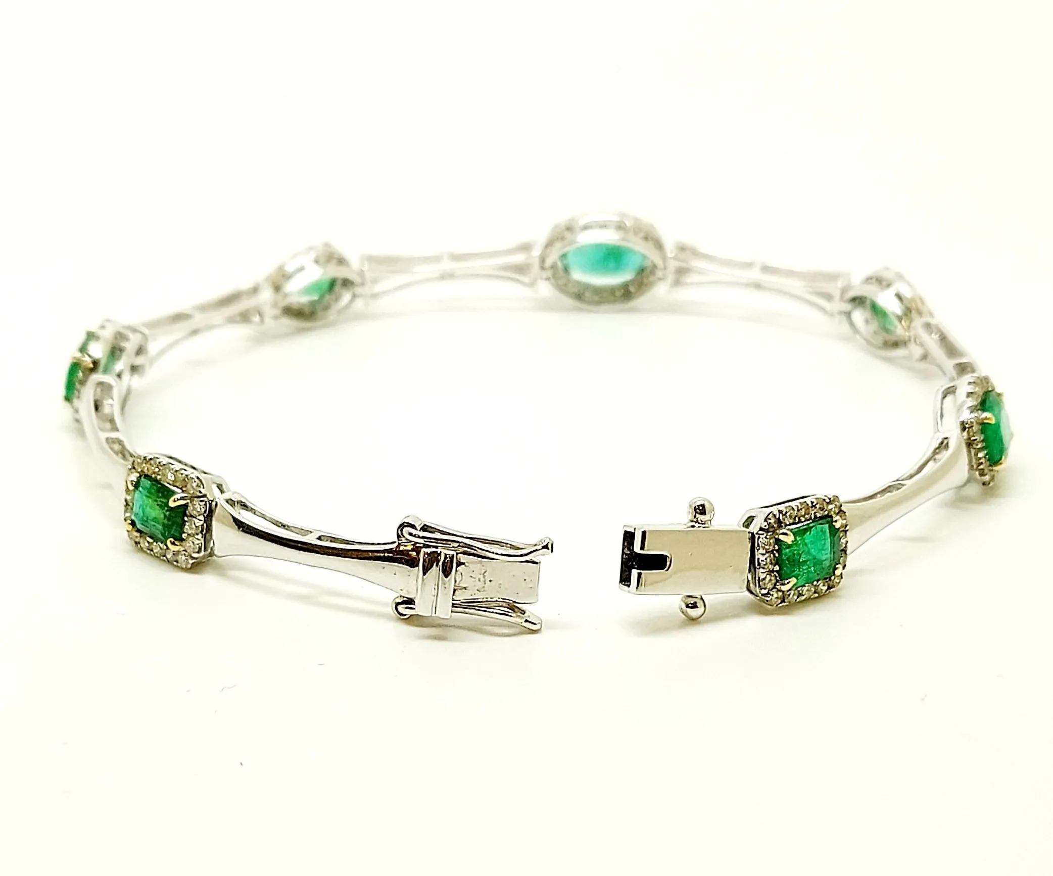 Emerald And Diamond Halo Stations Bracelet In 14k White Gold AD NO: 1954