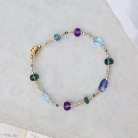 Gold Glass, Amethyst, Grandidierite, Sky Blue Topaz Bracelet