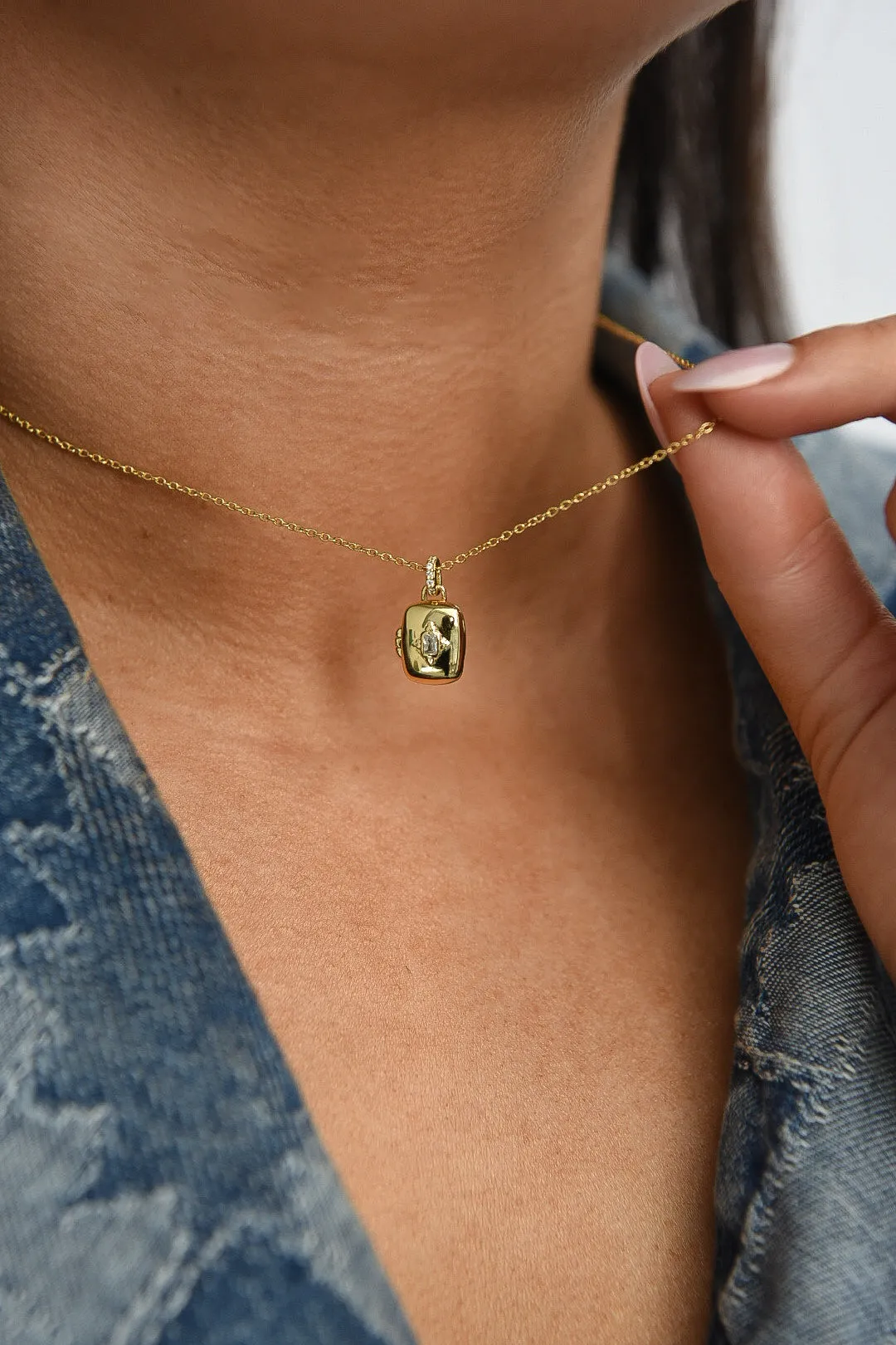 Golden Rectangular Locket With Celestial Centre