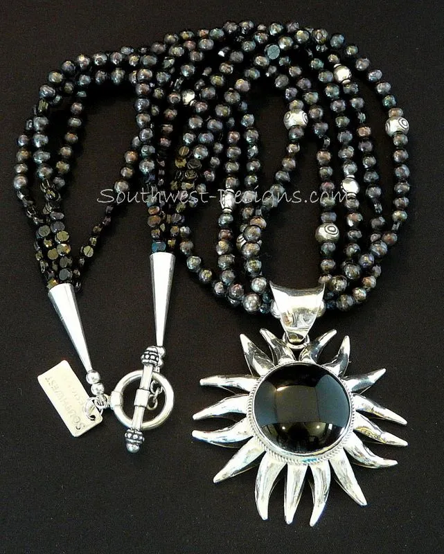 Onyx and Sterling Silver Sunflower Pendant with 4 Strands of Black Faceted Pearls, Czechoslovakian Nailheads, Sterling Silver Stamped Rondelles and Coin Beads, and Sterling Cones & Toggle Clasp