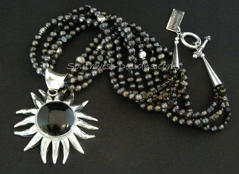 Onyx and Sterling Silver Sunflower Pendant with 4 Strands of Black Faceted Pearls, Czechoslovakian Nailheads, Sterling Silver Stamped Rondelles and Coin Beads, and Sterling Cones & Toggle Clasp