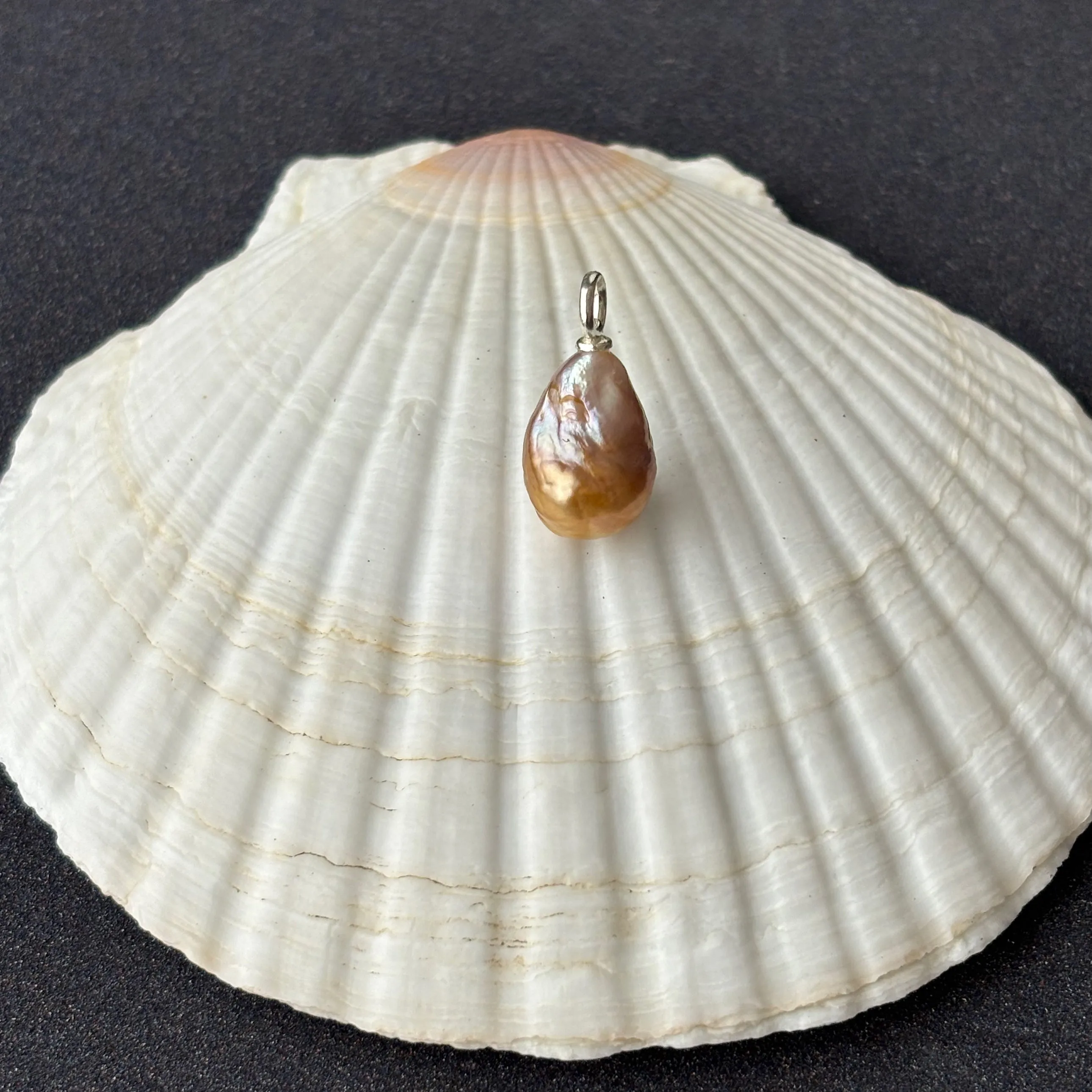 rippled surface golden Japan Kasumi pearl pendant in sterling silver