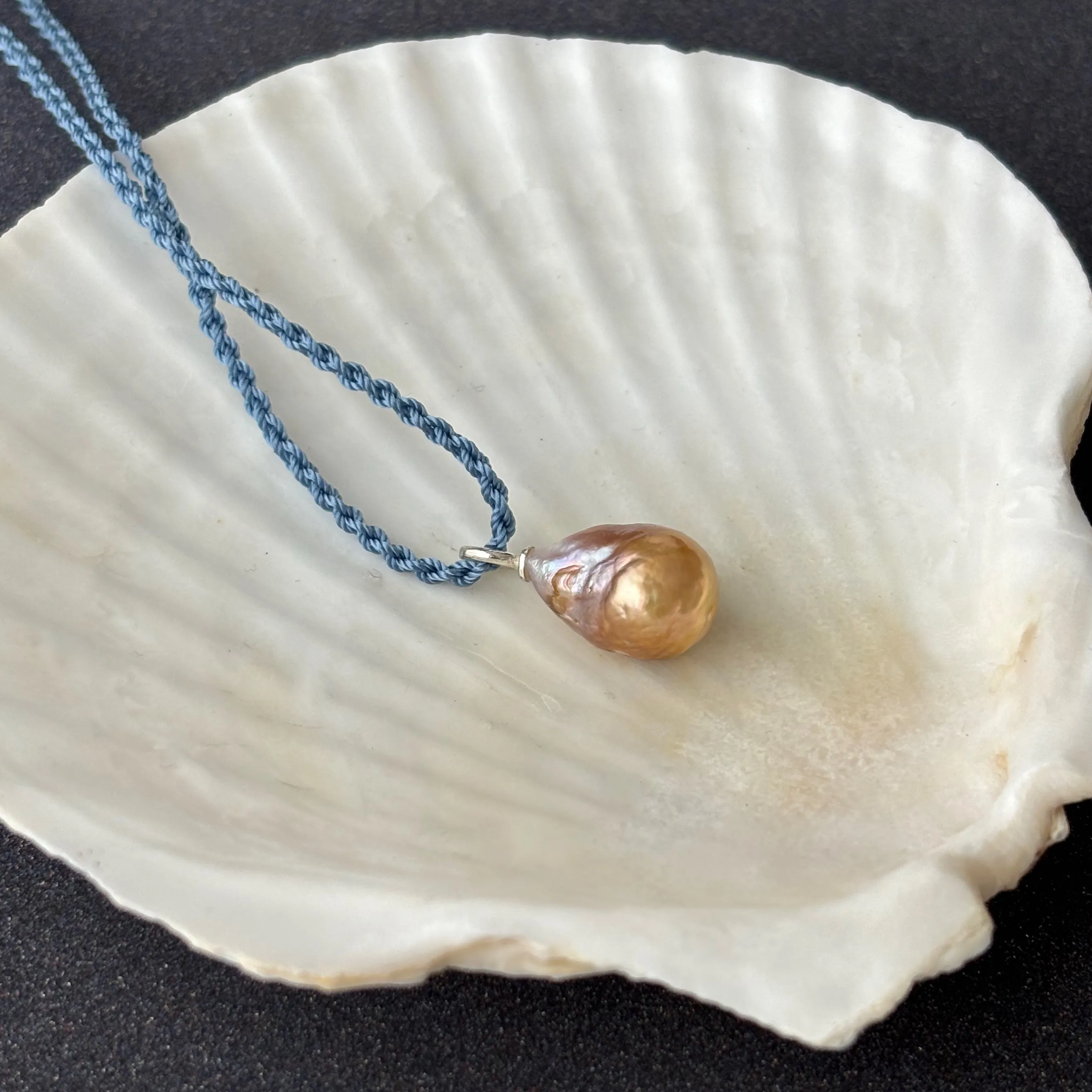 rippled surface golden Japan Kasumi pearl pendant in sterling silver