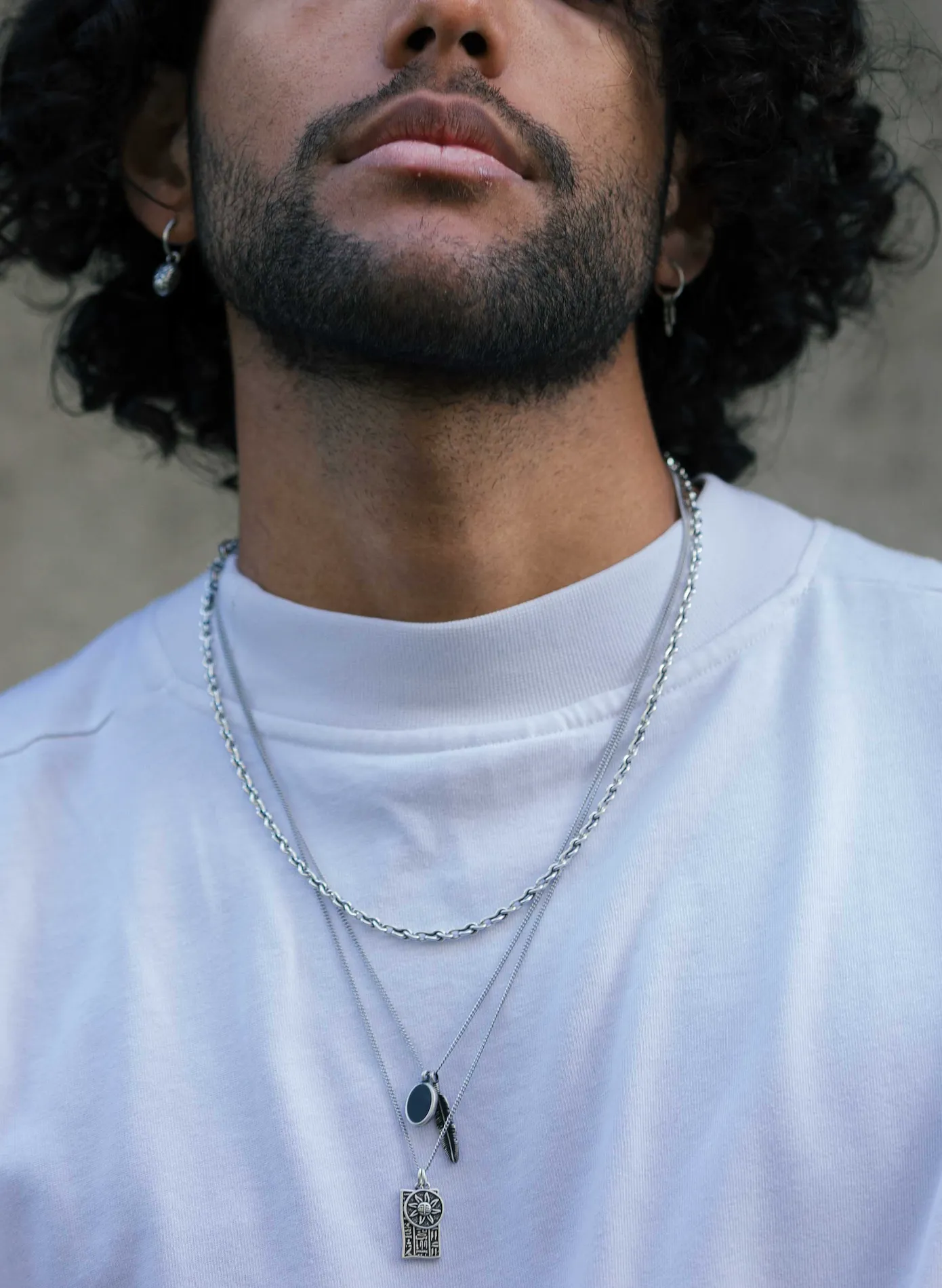 Silver Necklace With Feather And Matte Onyx Charm