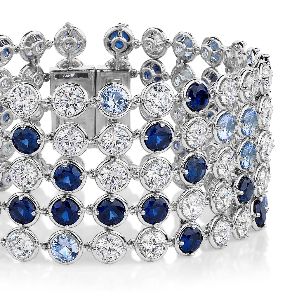 Statement bracelet with aqua and sapphire simulants and 34.04 carats* of diamond simulants in sterling silver