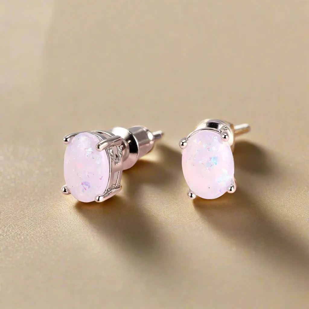 White Simulated Opal Oval Solitaire On 14K White Gold Plated Stud Earrings